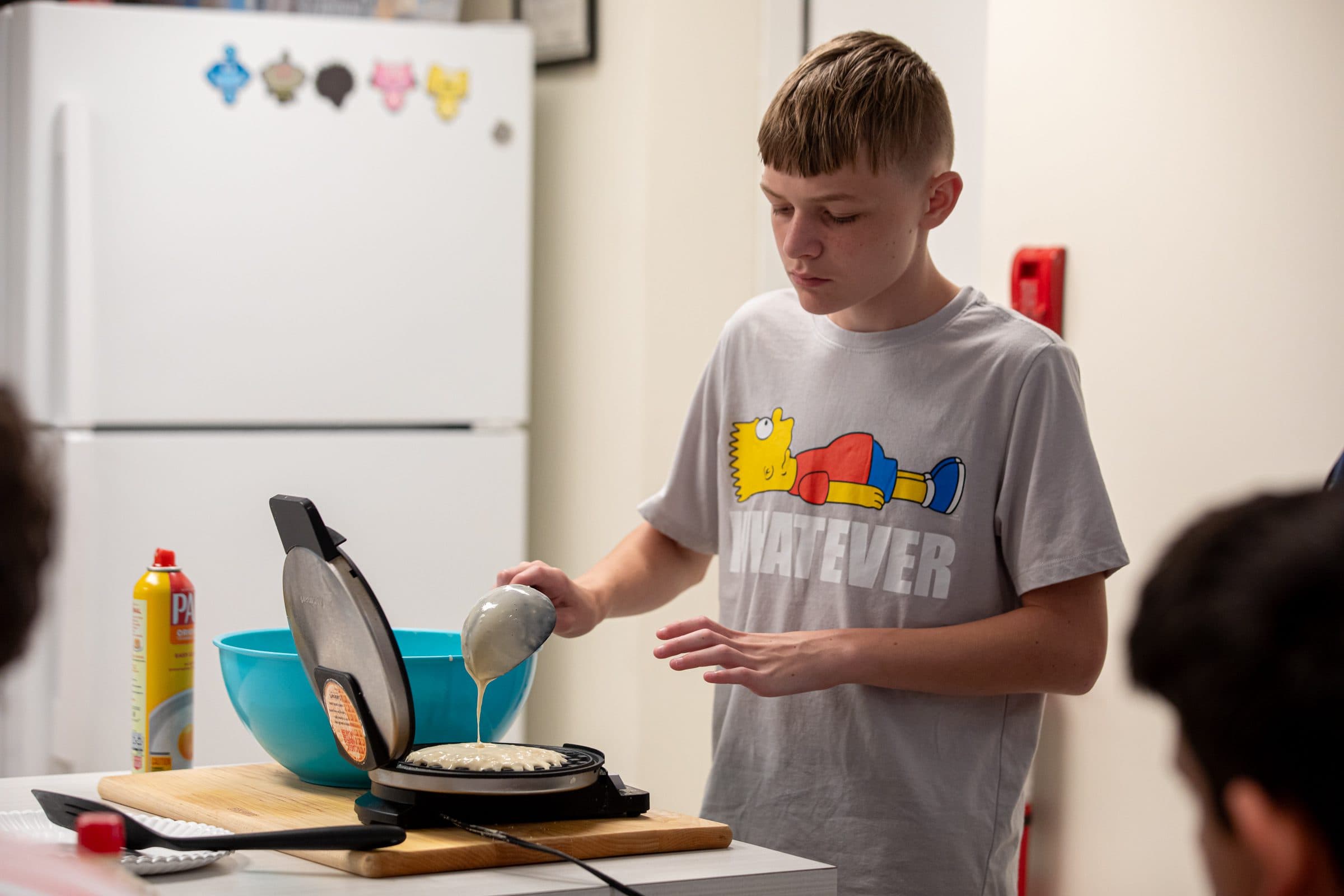 Student in the kitchen during a cooking lesson