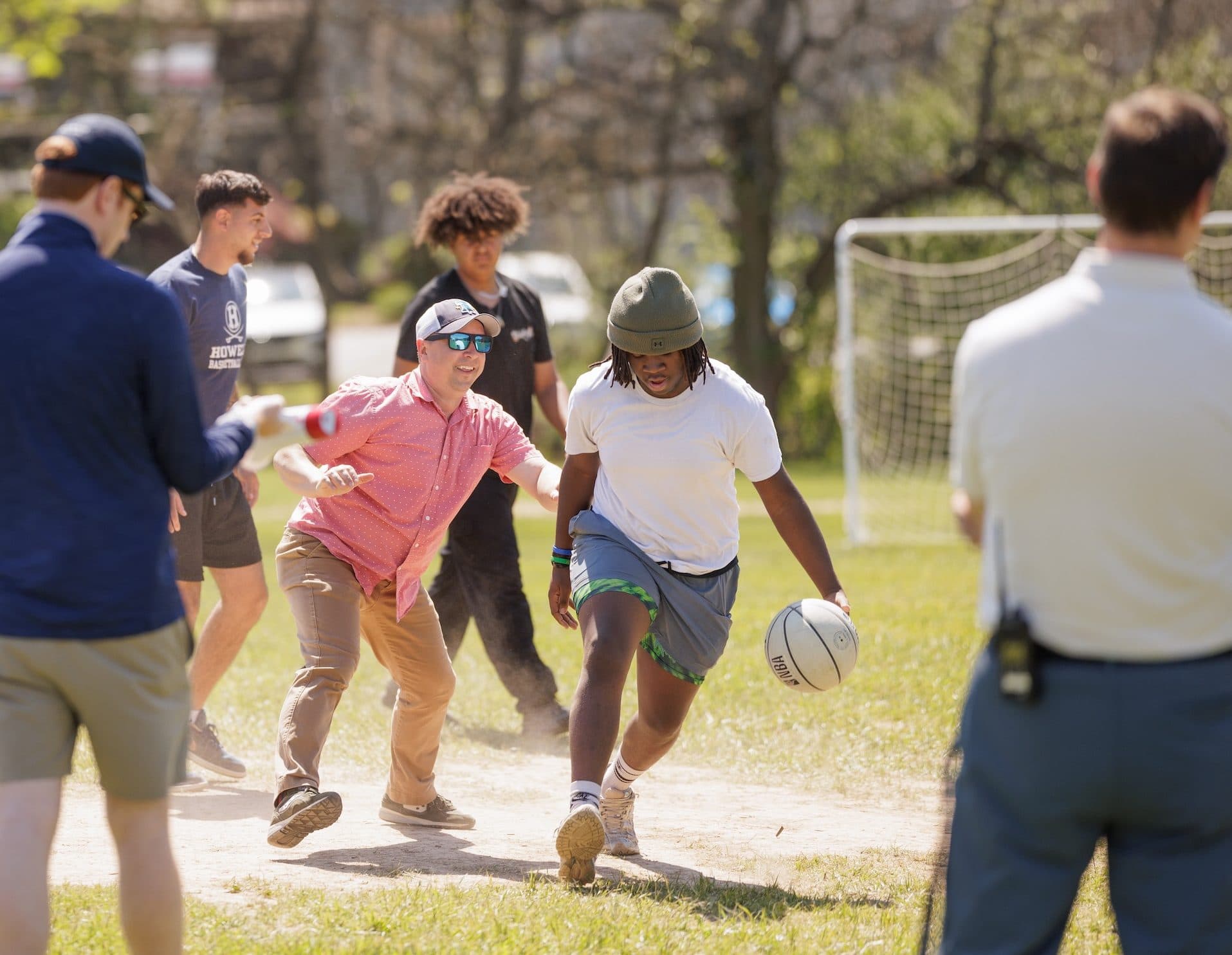 Students playing ball sports outdoors