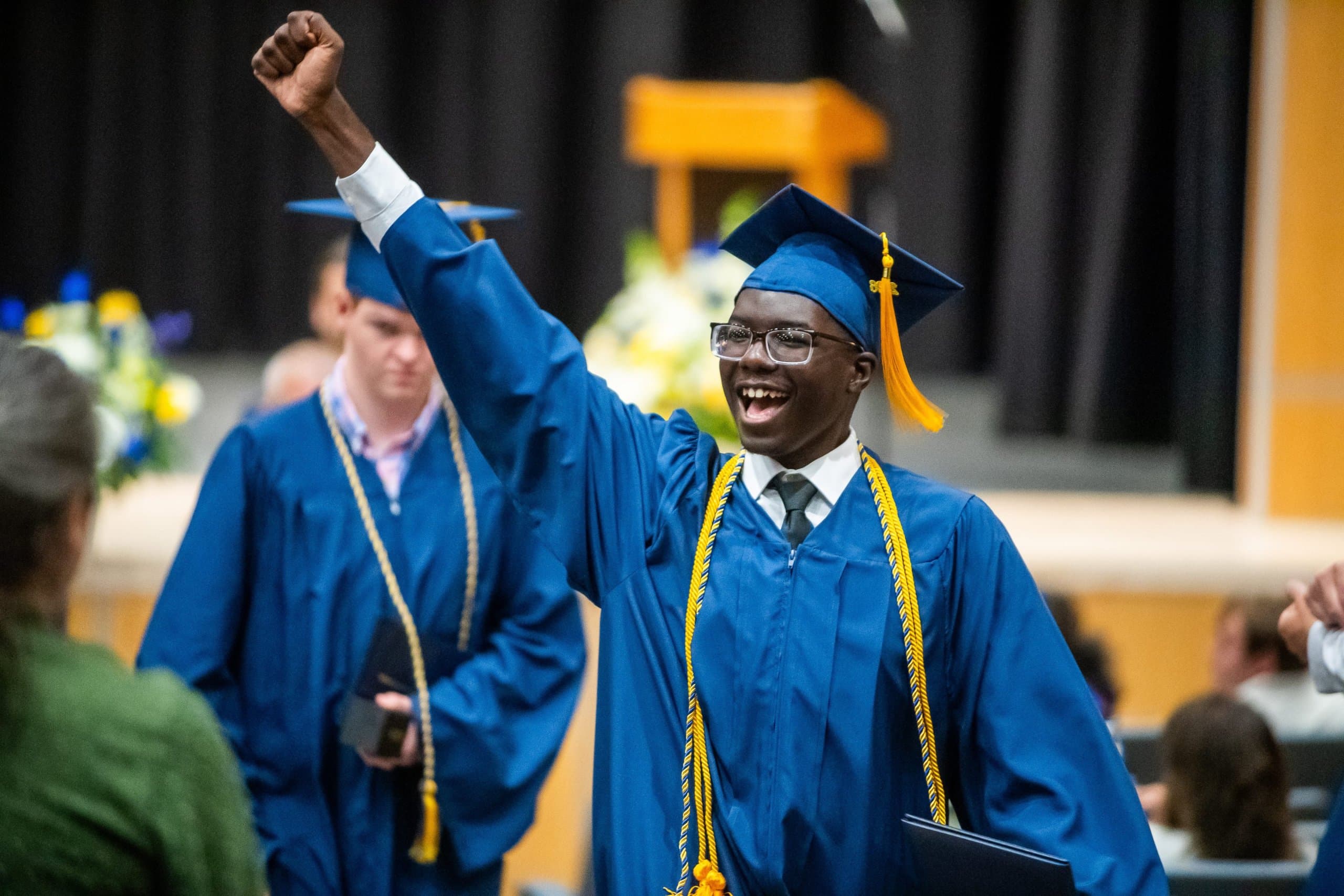 Graduate celebrating during commencement
