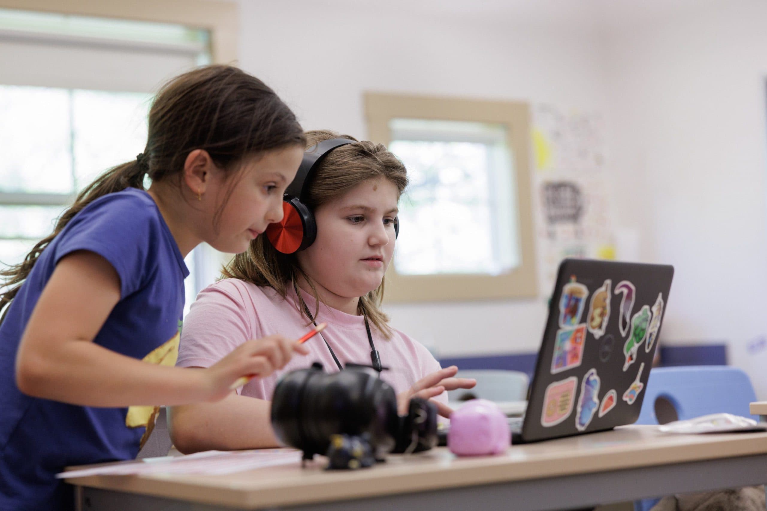 Students working together on a laptop