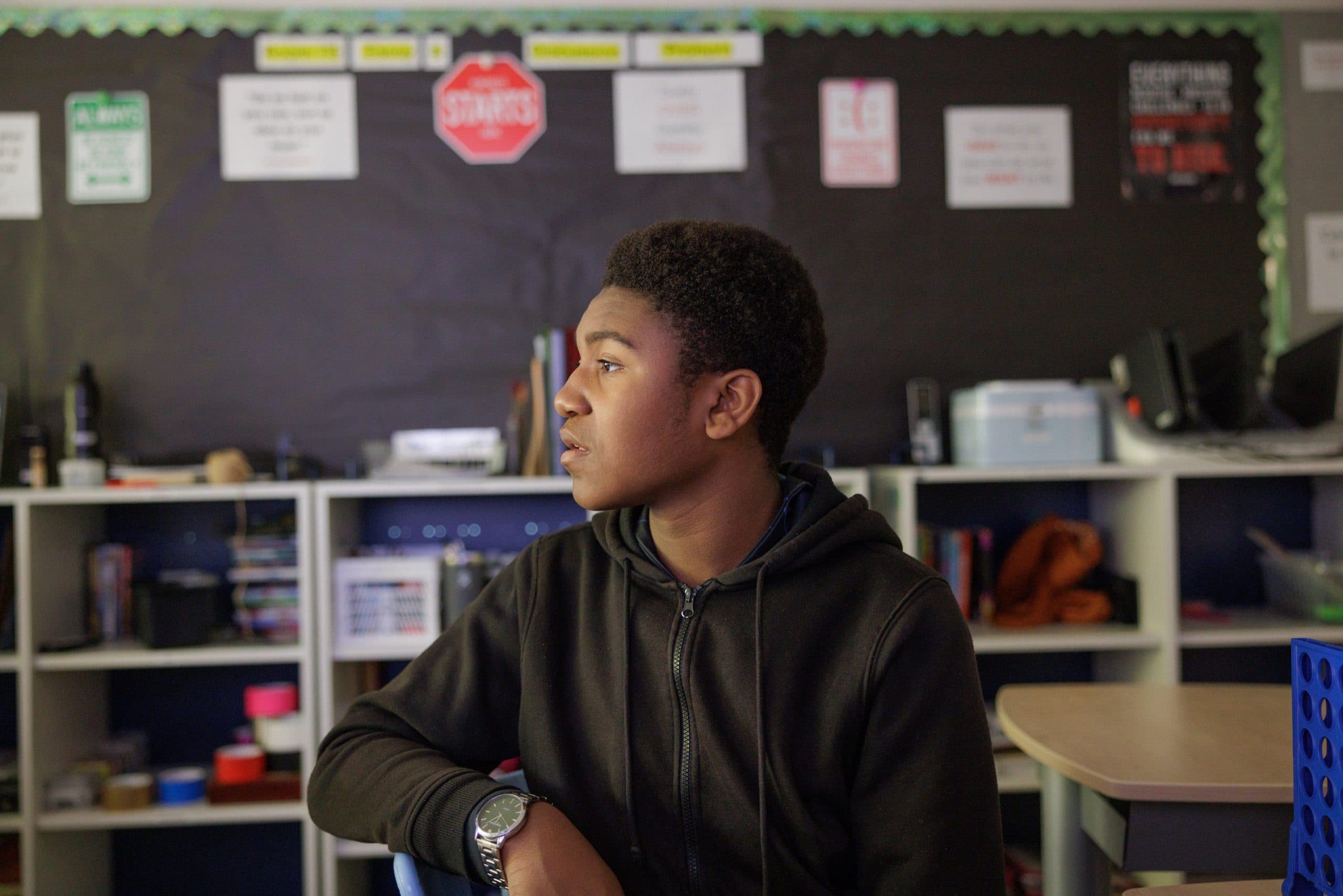 Student sat in a classroom
