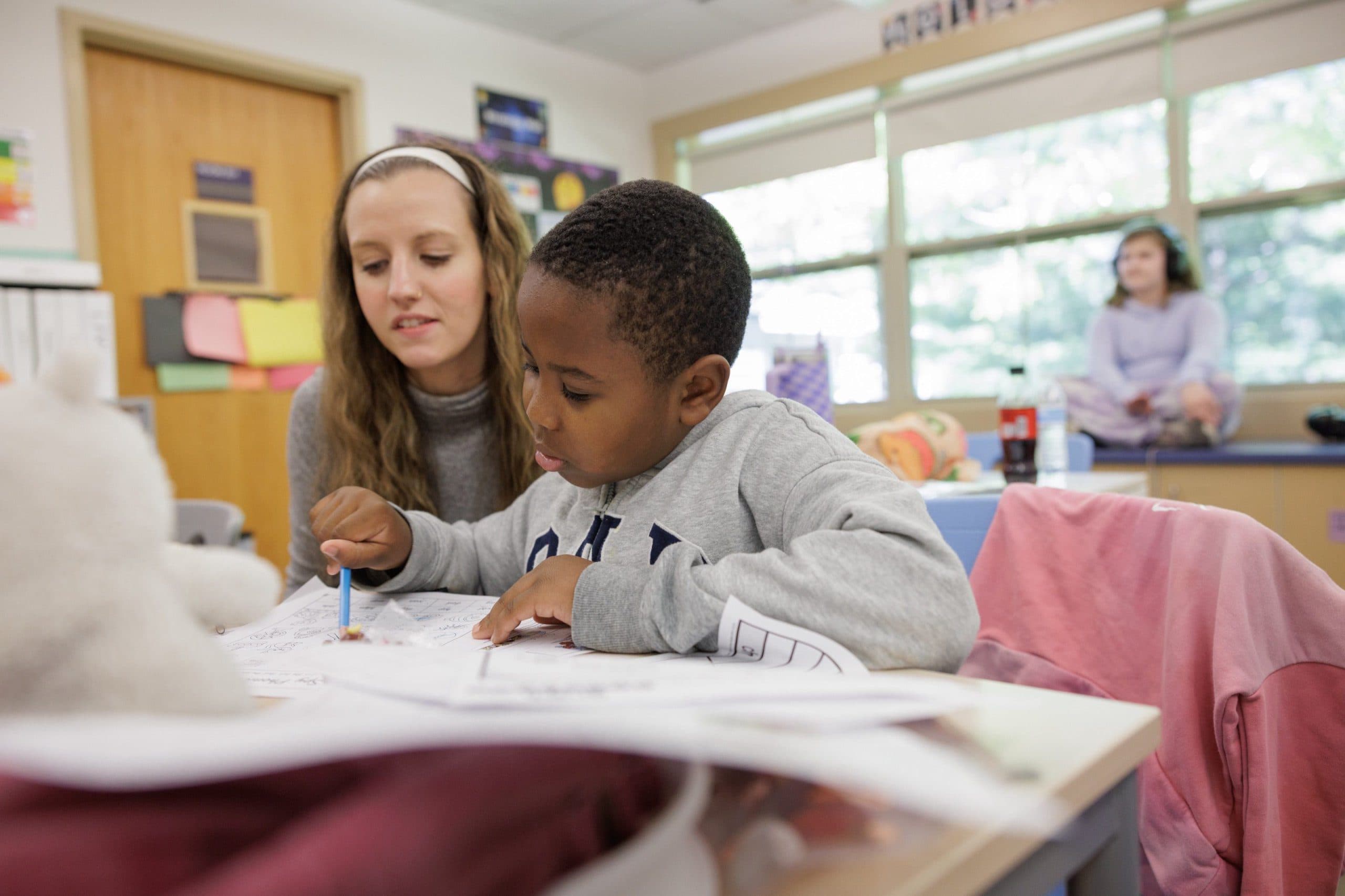 Student and teacher during a classroom activity