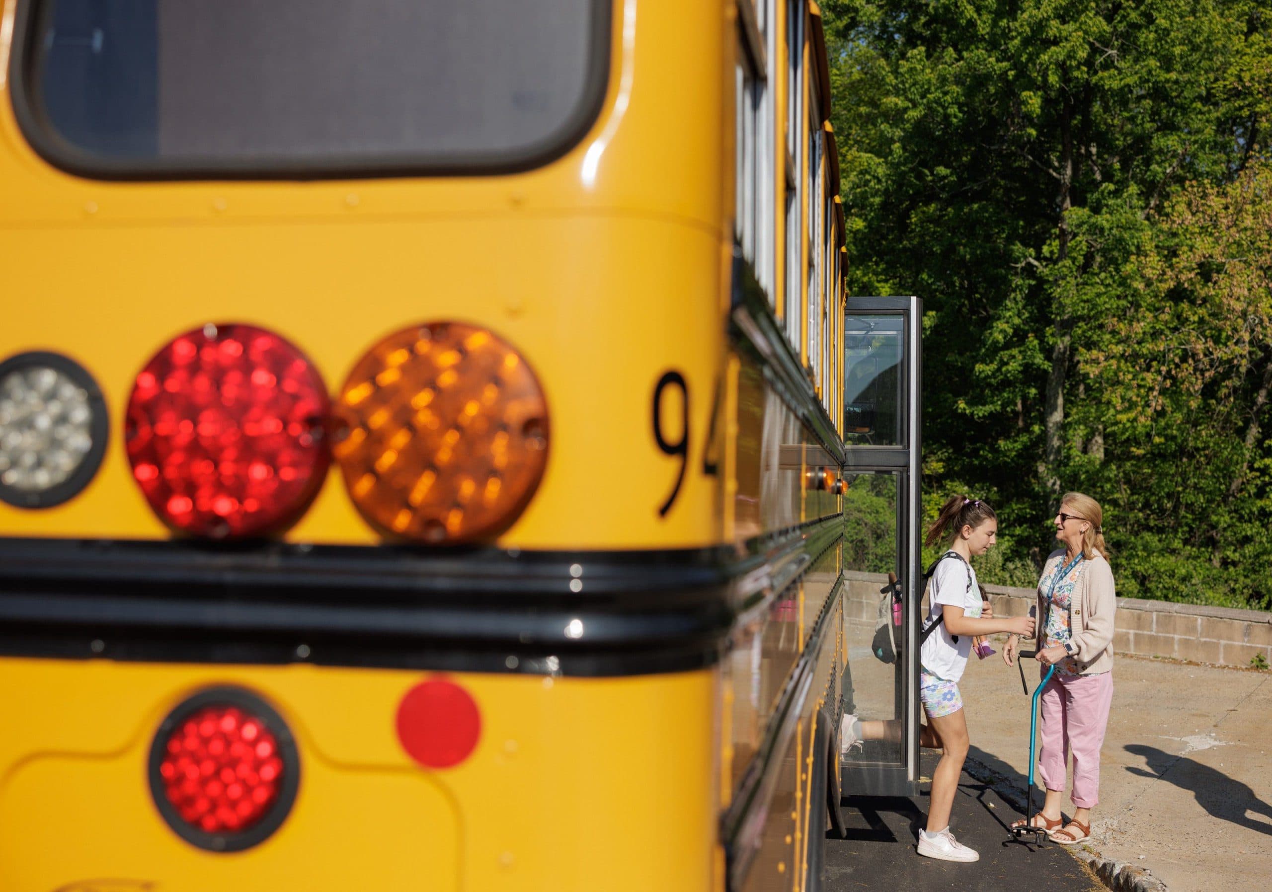 Students existing a school bus