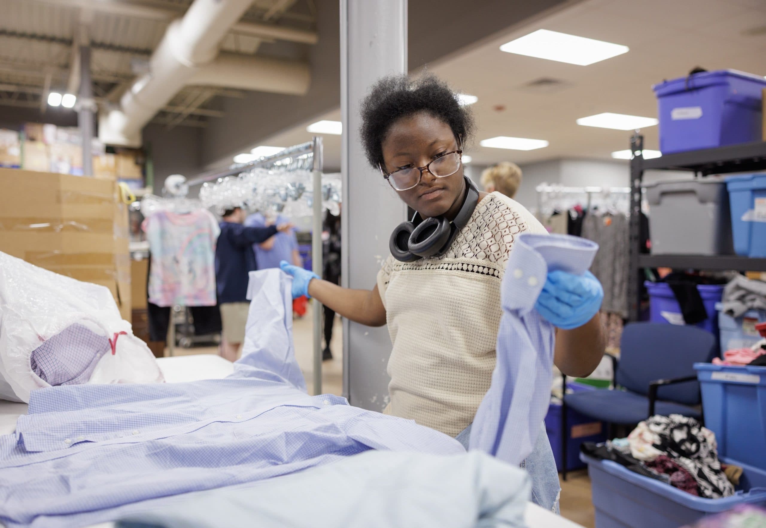 Student sorting items during a warehouse placement