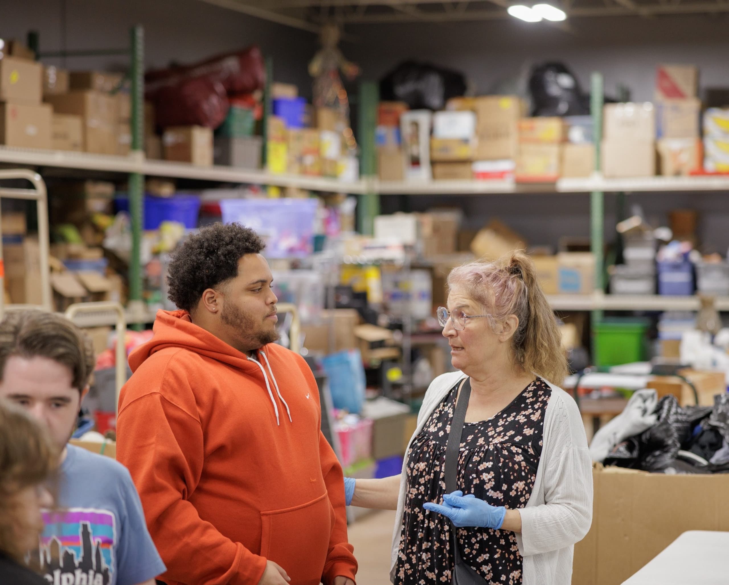 Student sorting items during a warehouse placement