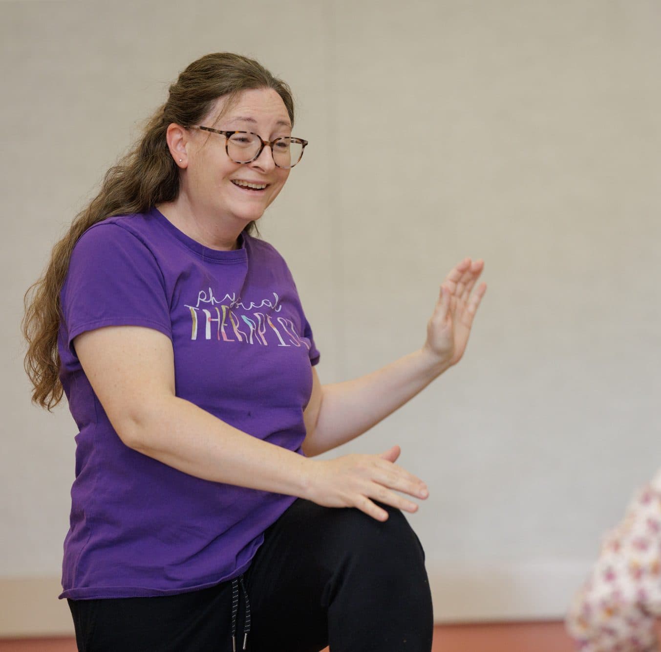 Teacher smiling during a movement session