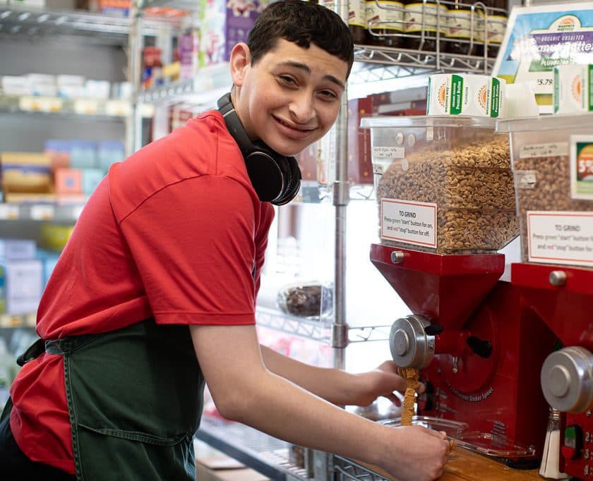 Student working at Weavers Way Co-op