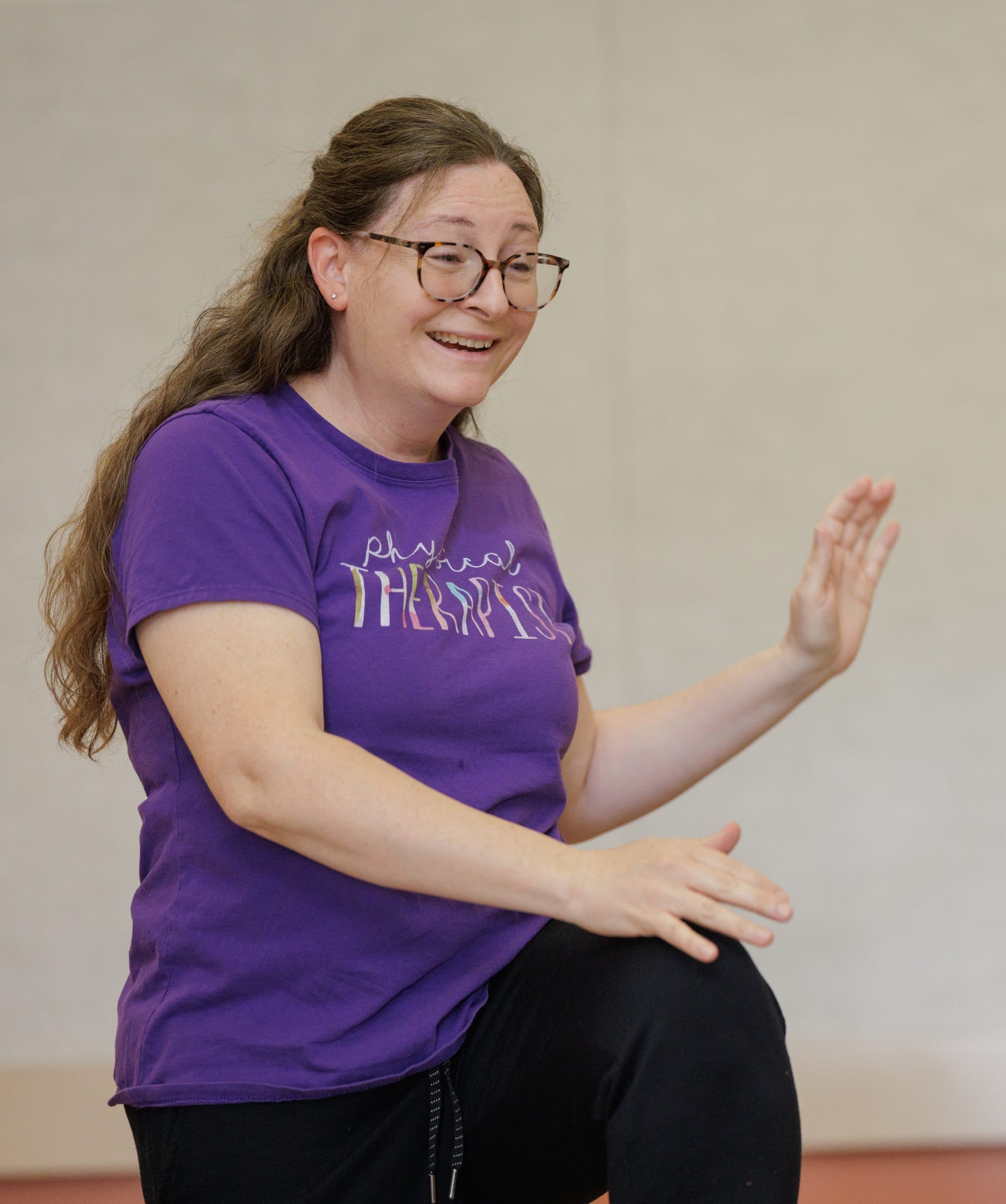 Female teacher demonstrating exercises