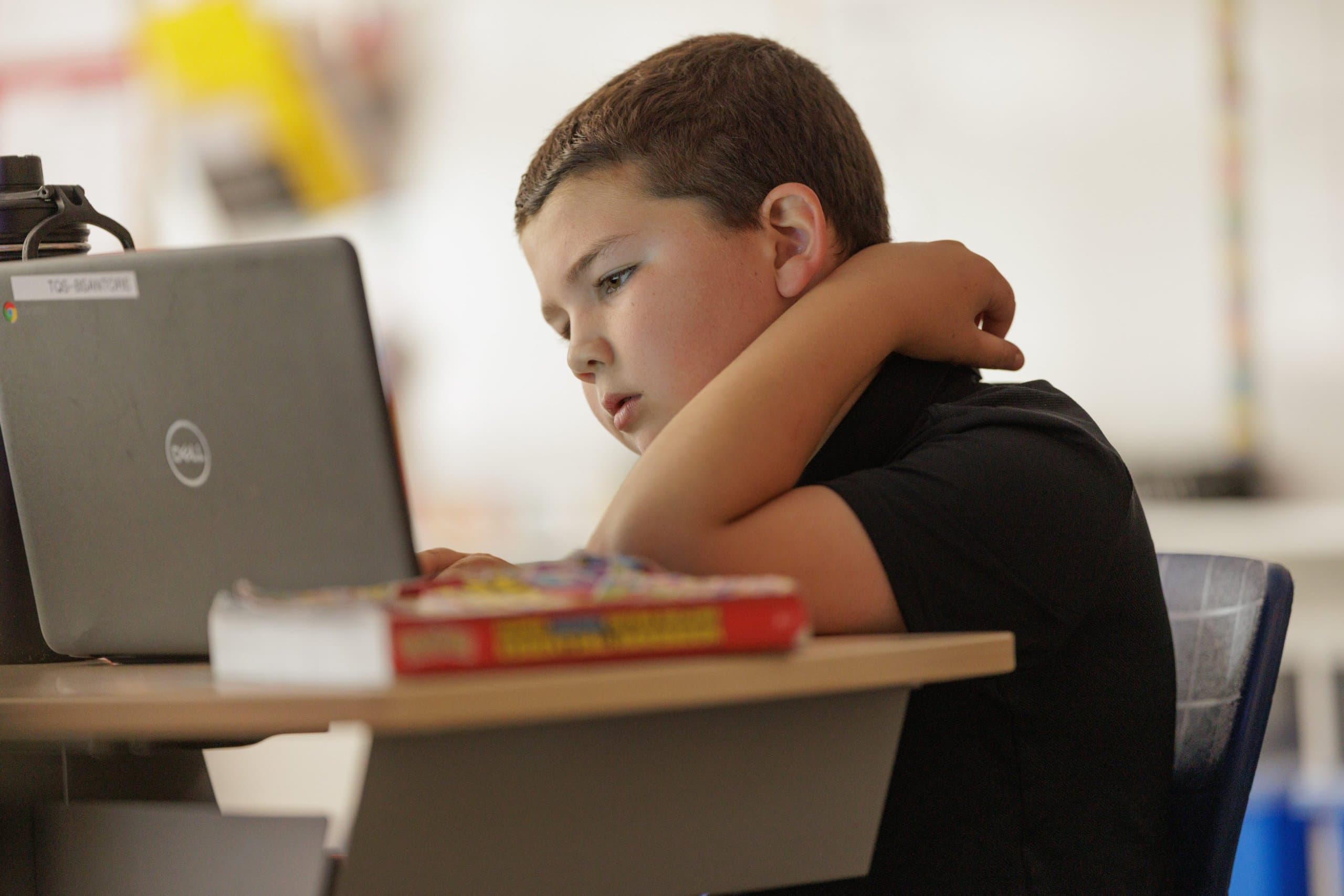 Student working on a laptop