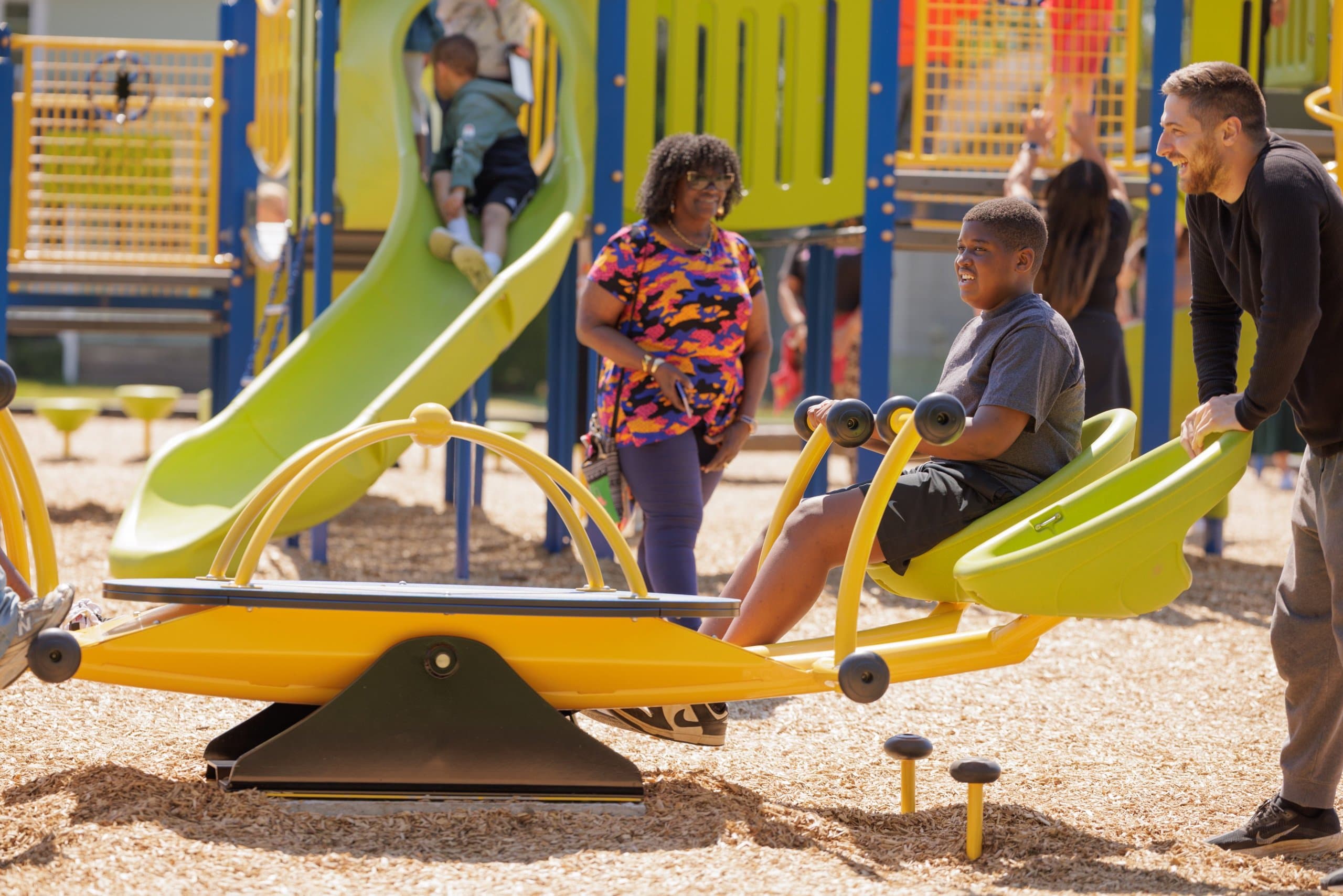 Students using playground equipment